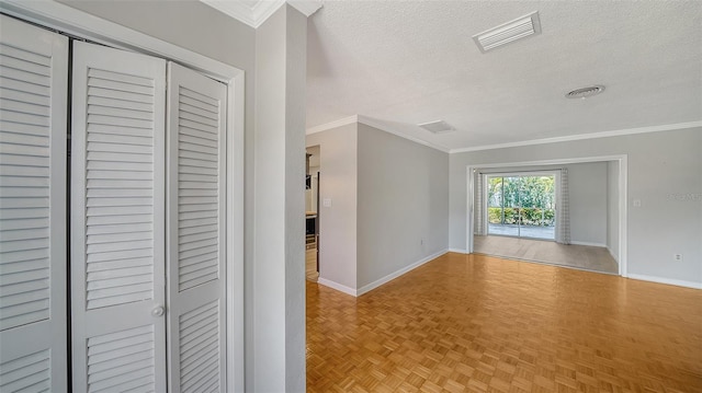 5706 10th Avenue Dr W, Bradenton, FL 34209 - corridor featuring baseboards, a textured ceiling, and ornamental molding