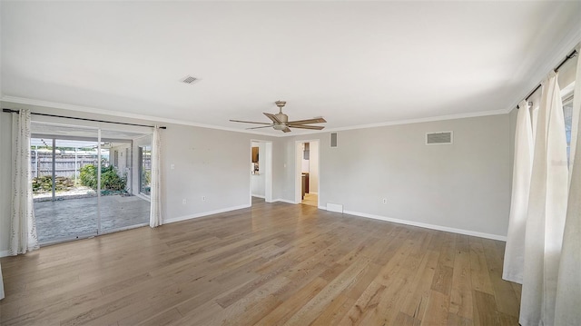 5706 10th Avenue Dr W, Bradenton, FL 34209 - unfurnished room with baseboards, wood finished floors, ornamental molding, and a ceiling fan