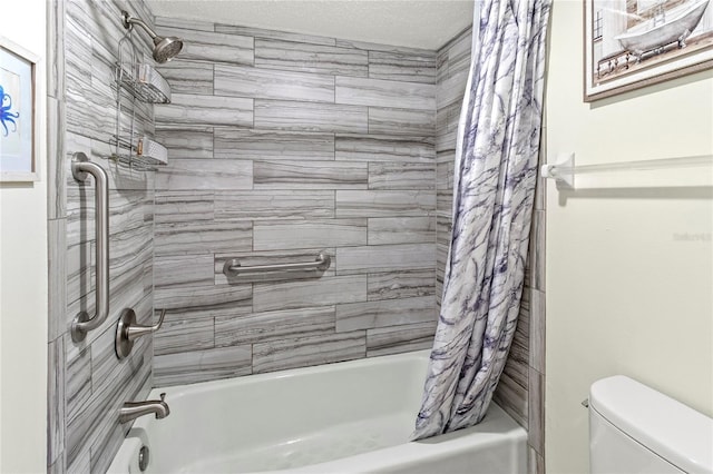 bathroom featuring shower / tub combo with curtain and toilet