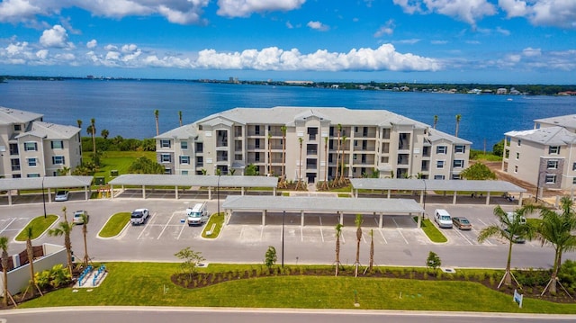 910 Tidewater Shores Loop Unit 103, Bradenton, FL 34208 - aerial view of a large body of water and apartment complex