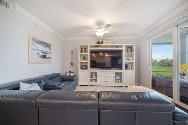 910 Tidewater Shores Loop Unit 103, Bradenton, FL 34208 - living room featuring ceiling fan and ornamental molding