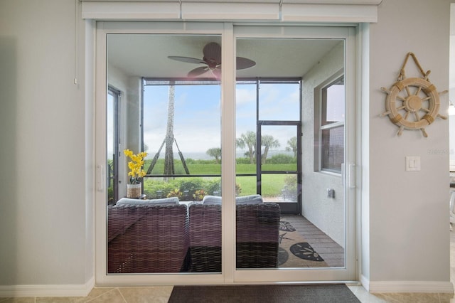 910 Tidewater Shores Loop Unit 103, Bradenton, FL 34208 - entryway featuring a ceiling fan and tile patterned floors