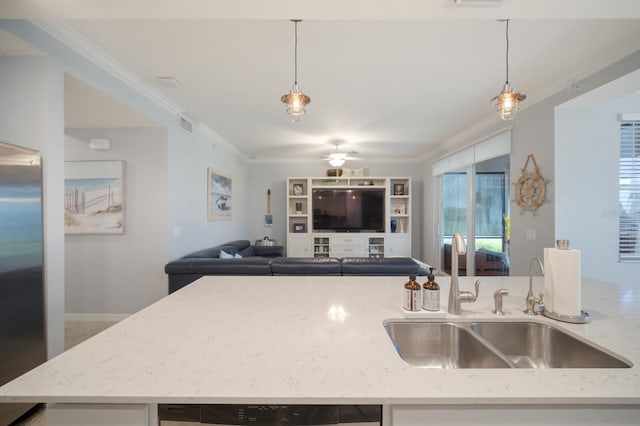 910 Tidewater Shores Loop Unit 103, Bradenton, FL 34208 - kitchen with a sink, ceiling fan, open floor plan, crown molding, and decorative light fixtures