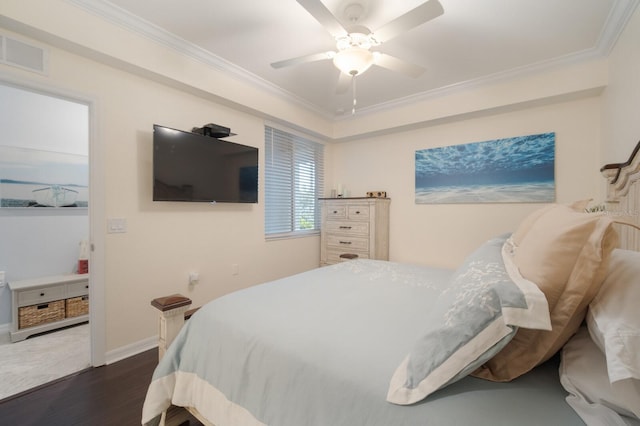 910 Tidewater Shores Loop Unit 103, Bradenton, FL 34208 - bedroom with dark wood-style flooring, ornamental molding, ceiling fan, and baseboards