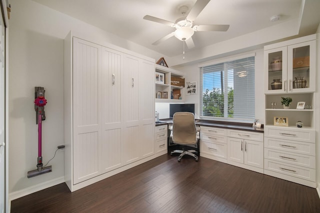 910 Tidewater Shores Loop Unit 103, Bradenton, FL 34208 - office space with built in study area, a ceiling fan, dark wood-type flooring, and baseboards