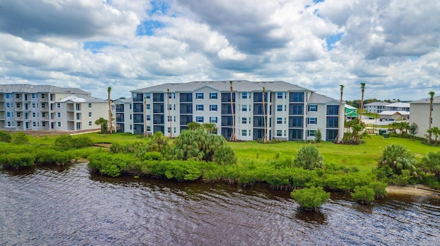 910 Tidewater Shores Loop Unit 103, Bradenton, FL 34208 - view of apartment building / complex with a water view