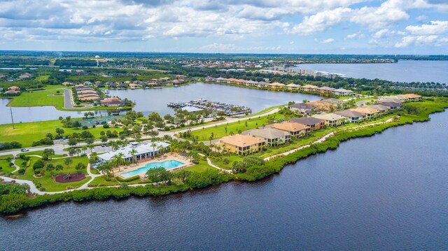 910 Tidewater Shores Loop Unit 103, Bradenton, FL 34208 - aerial view of a nearby body of water and a pool area