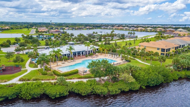 910 Tidewater Shores Loop Unit 103, Bradenton, FL 34208 - bird's eye view of a nearby body of water and a pool area
