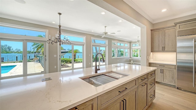 878 Freeling Dr, Sarasota, FL 34242 - kitchen with built in refrigerator, a sink, plenty of natural light, recessed lighting, and ceiling fan