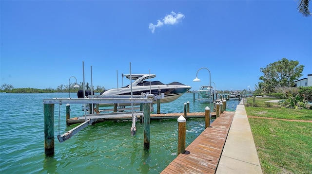878 Freeling Dr, Sarasota, FL 34242 - dock featuring boat lift and a water view