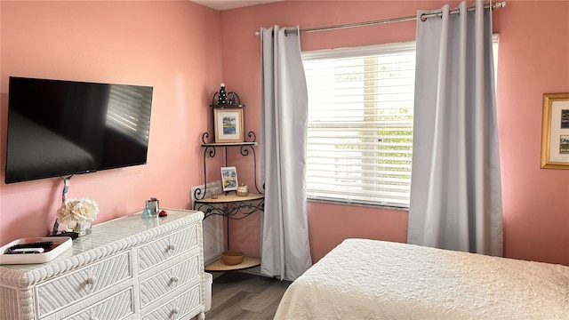 433 Cerromar Ln Unit 331, Venice, FL 34293 - bedroom with dark wood finished floors