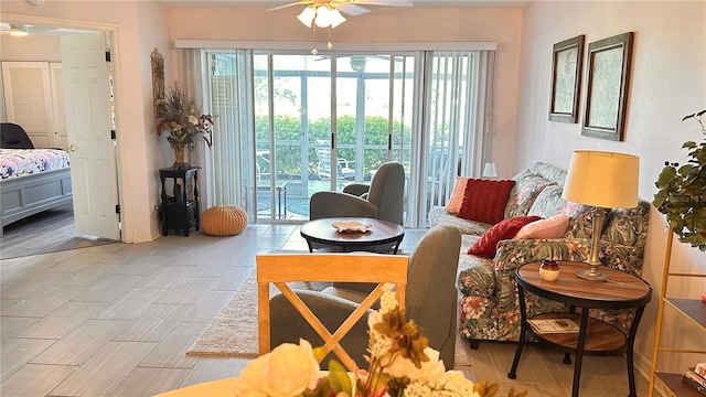 433 Cerromar Ln Unit 331, Venice, FL 34293 - living area featuring ceiling fan and wood finished floors