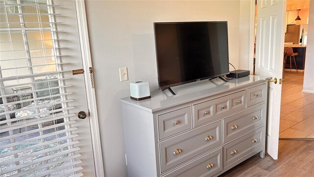 433 Cerromar Ln Unit 331, Venice, FL 34293 - detailed view of stainless steel fridge and wood finished floors