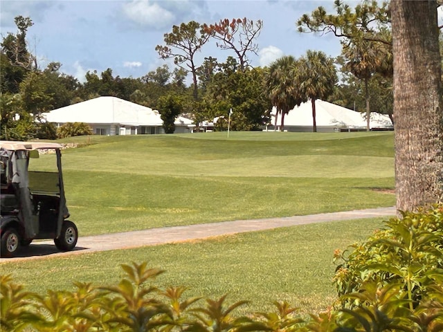 433 Cerromar Ln Unit 331, Venice, FL 34293 - view of property's community featuring a yard and golf course view