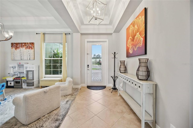 doorway to outside featuring a chandelier, ornamental molding, a raised ceiling, light tile patterned floors, and baseboards