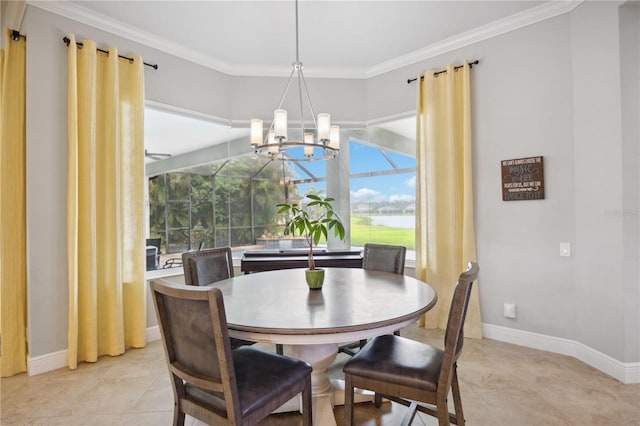 dining space with ornamental molding, a chandelier, and baseboards
