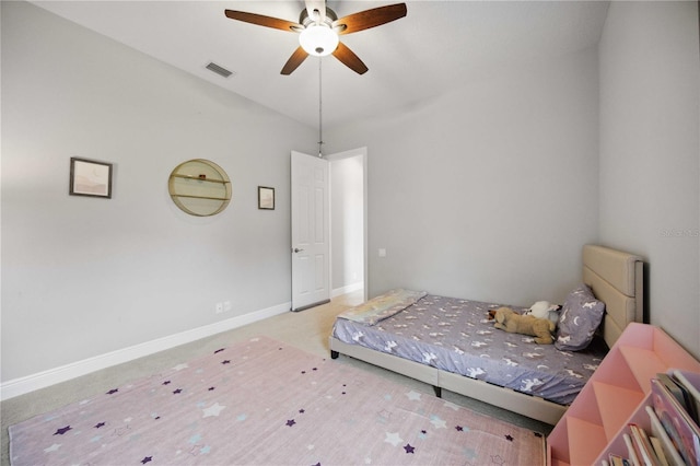 bedroom featuring baseboards, ceiling fan, and carpet flooring