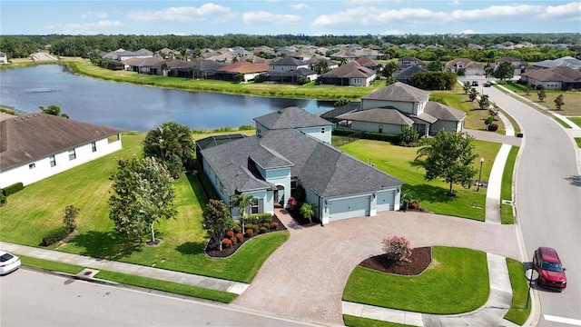 aerial perspective of suburban area featuring a large body of water