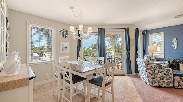 dining area with a chandelier