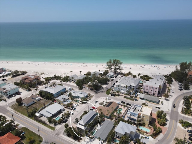 aerial view of property's location featuring unending shoreline