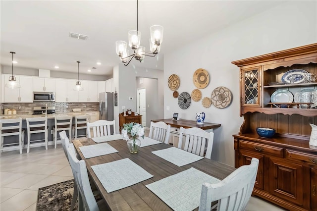 5165 Coral Reef Way, Bradenton, FL 34211 - dining room with a chandelier, recessed lighting, and light tile patterned flooring
