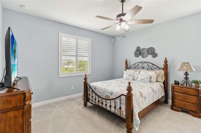 5165 Coral Reef Way, Bradenton, FL 34211 - bedroom with carpet, baseboards, and ceiling fan