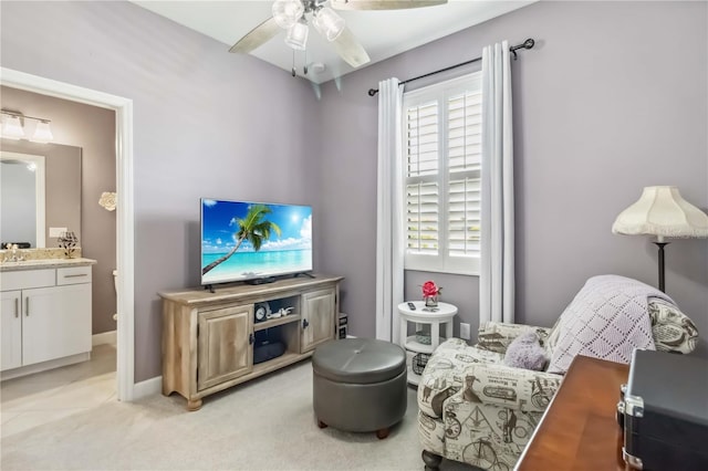 5165 Coral Reef Way, Bradenton, FL 34211 - living room with a ceiling fan, light carpet, and baseboards