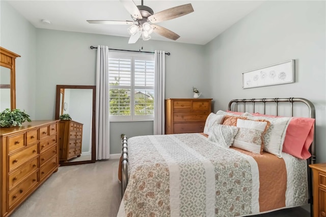 5165 Coral Reef Way, Bradenton, FL 34211 - bedroom featuring light carpet, a ceiling fan, and baseboards