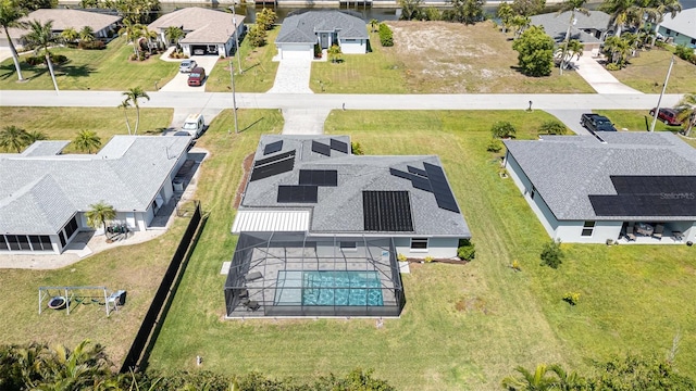 aerial perspective of suburban area with a pool area