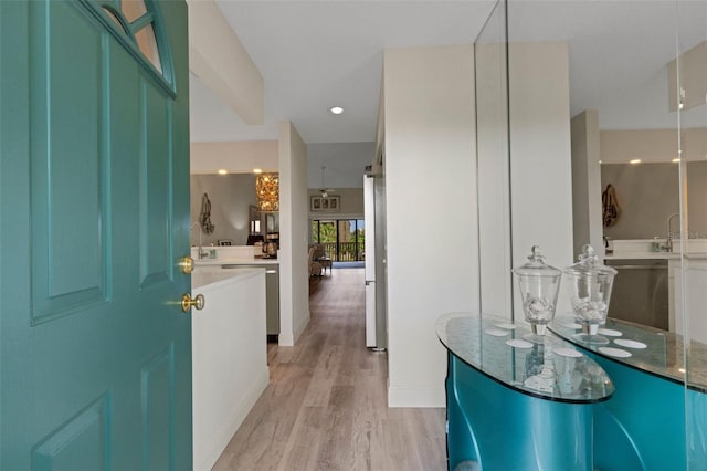 5632 Ashton Lake Dr Unit 5632, Sarasota, FL 34231 - corridor featuring light wood finished floors and baseboards