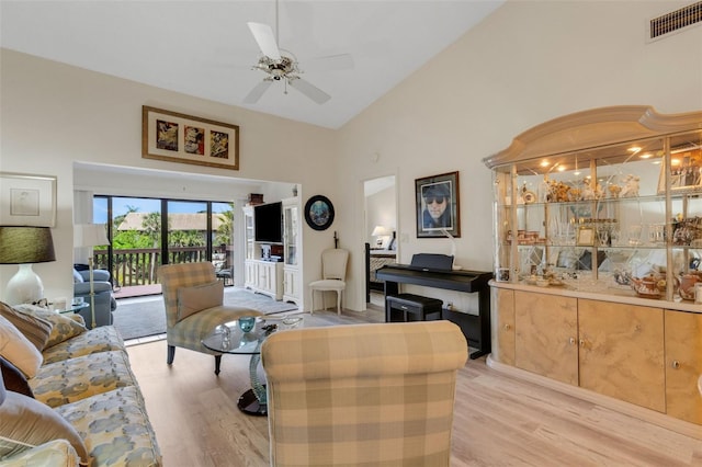 5632 Ashton Lake Dr Unit 5632, Sarasota, FL 34231 - living area featuring high vaulted ceiling, light wood-type flooring, and a ceiling fan