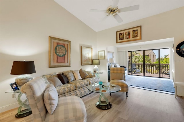 5632 Ashton Lake Dr Unit 5632, Sarasota, FL 34231 - living area featuring wood finished floors, baseboards, high vaulted ceiling, and ceiling fan