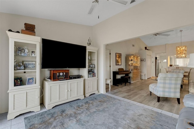 5632 Ashton Lake Dr Unit 5632, Sarasota, FL 34231 - living room with a ceiling fan, a chandelier, and vaulted ceiling