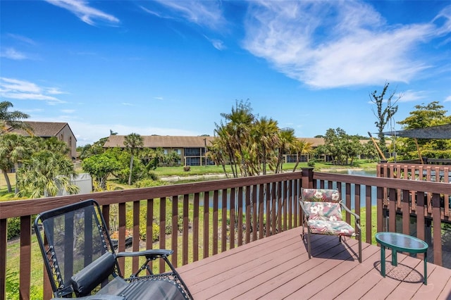5632 Ashton Lake Dr Unit 5632, Sarasota, FL 34231 - wooden terrace featuring a water view
