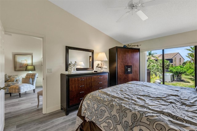 5632 Ashton Lake Dr Unit 5632, Sarasota, FL 34231 - bedroom with vaulted ceiling, light wood finished floors, baseboards, and ceiling fan
