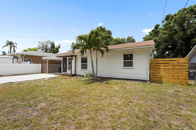 3616 Stardust Pl, Sarasota, FL 34232 - rear view of house with driveway