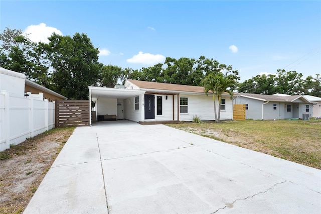3616 Stardust Pl, Sarasota, FL 34232 - view of front of home featuring driveway and an attached carport