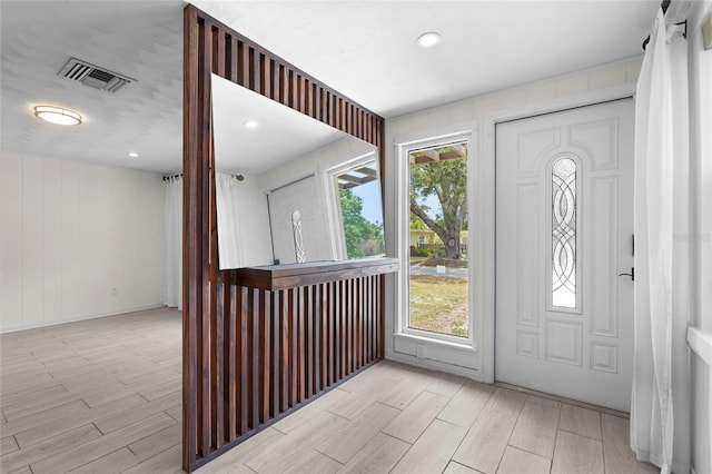 3616 Stardust Pl, Sarasota, FL 34232 - foyer entrance featuring wood finished floors