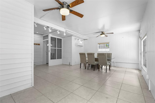 3616 Stardust Pl, Sarasota, FL 34232 - dining area featuring ceiling fan, an AC wall unit, light tile patterned floors, and track lighting
