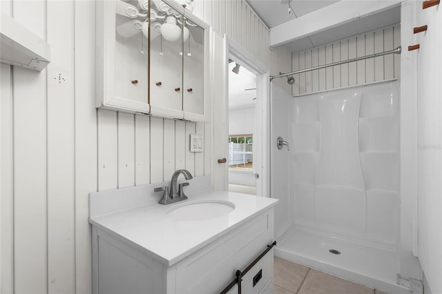 3616 Stardust Pl, Sarasota, FL 34232 - full bath featuring a stall shower, vanity, and tile patterned floors