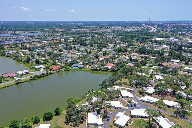 415 Courbet Dr Unit 415, Nokomis, FL 34275 - aerial view of property's location featuring a large body of water and nearby suburban area