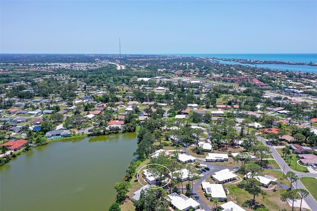 415 Courbet Dr Unit 415, Nokomis, FL 34275 - aerial overview of property's location featuring a large body of water and nearby suburban area
