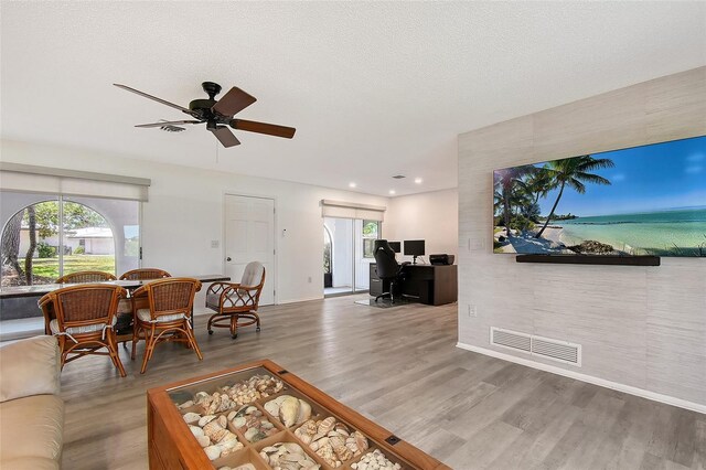 415 Courbet Dr Unit 415, Nokomis, FL 34275 - living room featuring wood finished floors, an office area, ceiling fan, and recessed lighting