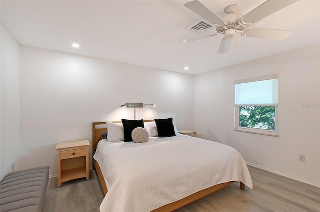 415 Courbet Dr Unit 415, Nokomis, FL 34275 - bedroom featuring wood finished floors, baseboards, ceiling fan, and recessed lighting