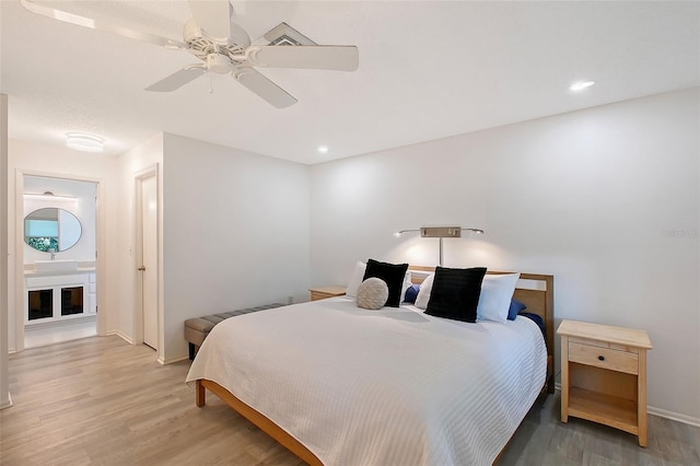 415 Courbet Dr Unit 415, Nokomis, FL 34275 - bedroom with light wood-style flooring, baseboards, a ceiling fan, and recessed lighting