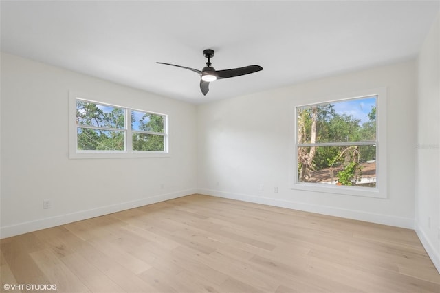 2655 Bay St, Sarasota, FL 34237 - spare room featuring baseboards, light wood-type flooring, and a ceiling fan