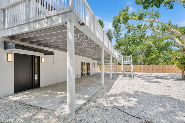 2655 Bay St, Sarasota, FL 34237 - view of patio featuring stairway and fence