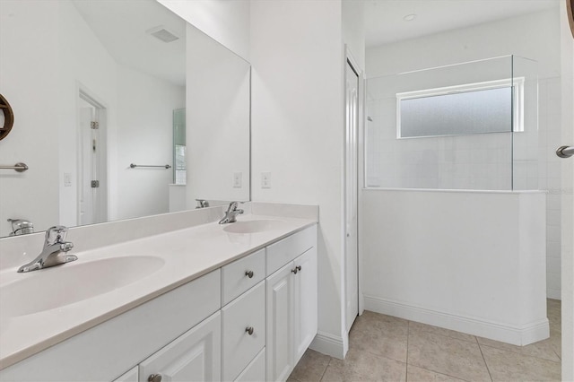 4315 Deep Creek Ter, Parrish, FL 34219 - bathroom featuring walk in shower, double vanity, and tile patterned flooring