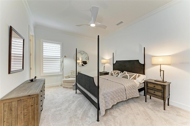bedroom with ornamental molding, light colored carpet, baseboards, and ceiling fan