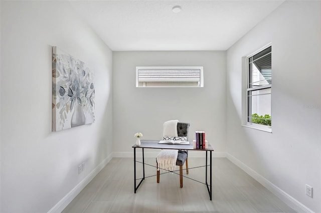 office area featuring baseboards